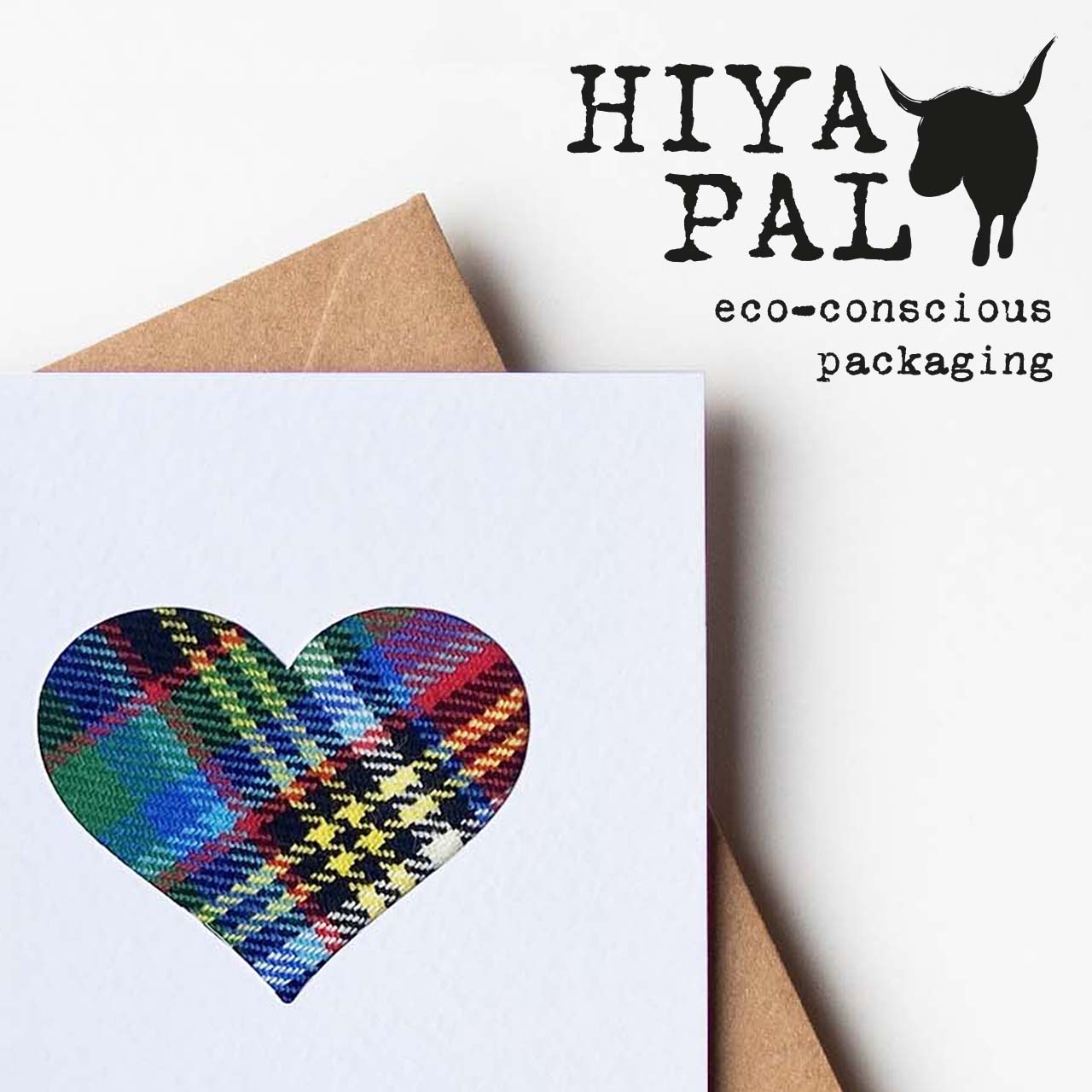 close up of scottish greeting card with tartan heart and hiya pal logo 